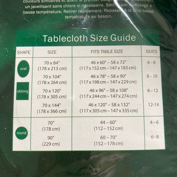 NEW UNOPENED “LINEN N THINGS”BRAND 70” X 104” OVAL SIZE POINSETTIA TABLECLOTH - Picture 3 of 4